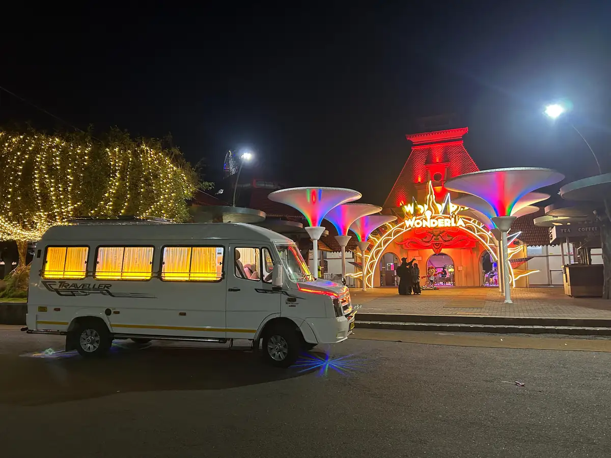 Luxury Force Traveller arriving at Wonderla at night